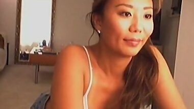 Japanese cutie shows her boobies on the webcam