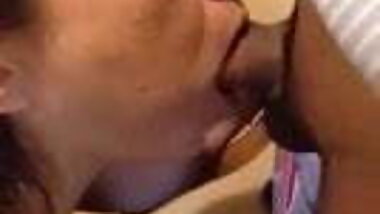 Japanese mature woman doing a blowjob