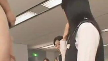 Asian CFNM guy wanks in office