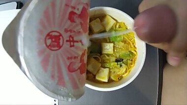 Japanese boy eats ramen noodle with his sperm.
