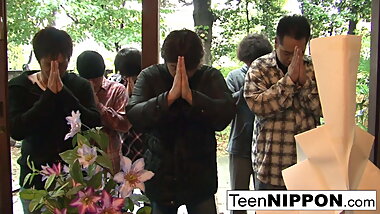 Japanese girl plays with her pussy while some boys peep