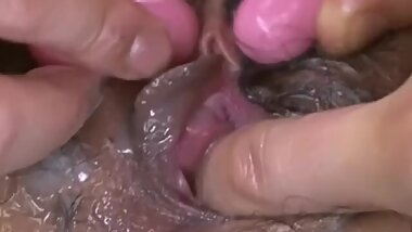 Hairy Japanese pussy has three viing bullets all over it