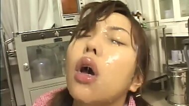 Sweetie Asian chick is swallowing some juice