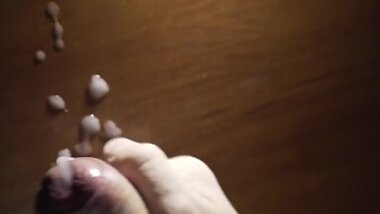 Thick cum on table from uncut cock