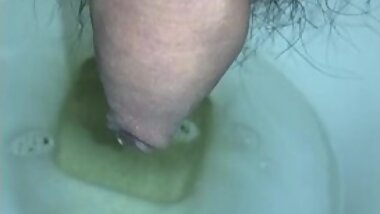 Basketball part DK Uncut See urination with the skin covered.