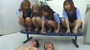 Four Japanese OLs spitting on coworker