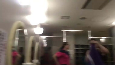 Film swimming athletes in change room 1