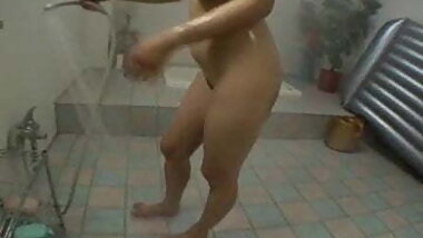 Asian bitch has a shower and a cock to suck