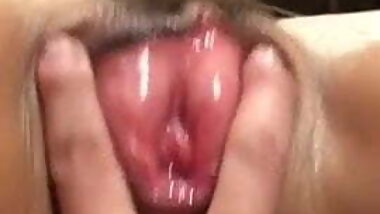 Japanese husband spreads his wife's pussy