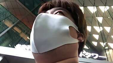 A man in disbelief after discovering a mysterious smoldering ball.