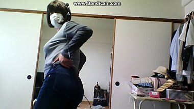 A perverted old man dressed as a woman at home while without a family. ?He is 60 years old