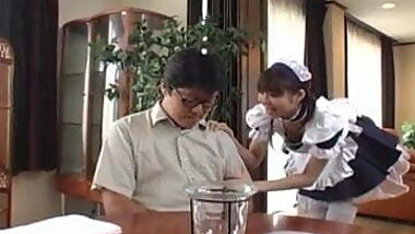 Pretty Asian maid, Natsumi exposes hot pussy for fingering