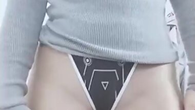 Japanese woman takes off her tight clothes and shows her full groin area in a super high-leg thong s