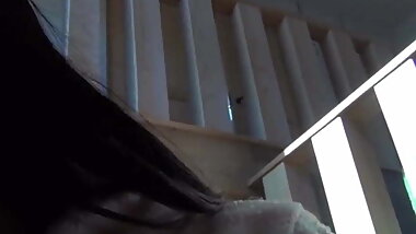 Japanese chick wakes up and pees in a jar while on the floor