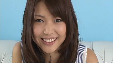 Smiling babe Megumi Shino is poking that snatch